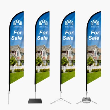 Four tall, curved flags displaying "For Sale" with a house image and blue background.